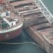Lightering of based Great Lakes bulker obtains underway image description