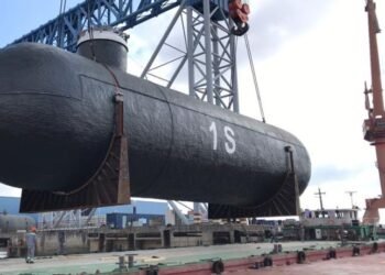 One of four cargo tanks being loaded onto a barge. The tanks will be transported on barges from Qidong to Shanghai where they will be lifted onboard a seagoing vessel. Copyright - Logistics Plus