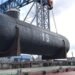 One of four cargo tanks being loaded onto a barge. The tanks will be transported on barges from Qidong to Shanghai where they will be lifted onboard a seagoing vessel. Copyright - Logistics Plus