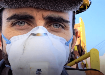 Seafarer wearing PPE kit during COVID 19 pandemic onboard