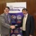 Kongsberg Marine’s Konrad Mech shakes hands with Harry Gandhi, chief executive of Unique Group