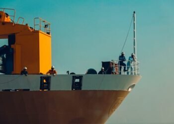 Ship front with crew members