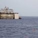 Costa Concordia wreckage is drifting greater image description