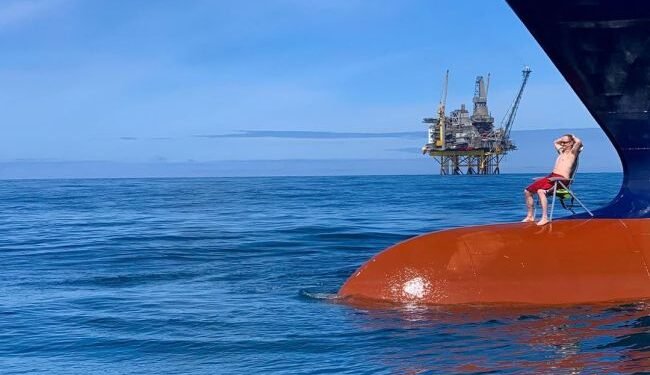 Watch: Picture Of Sailor Sunbathing On Bulbous Bow Of Vessel