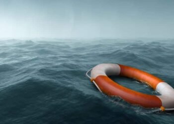 Lifebuoy floating in the vast expanse of sea