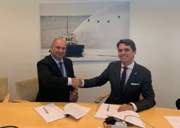 Two men shake hands on deal