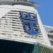 Royal Caribbean places concentrate on safety and security, price cuts and also liquidity Royal Caribbean logo on ship