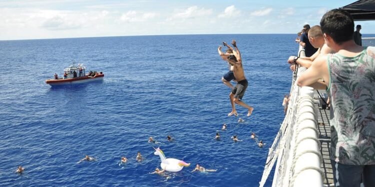 Shark! Coast Guard Fires at Shark Trying to Crash Swim Call