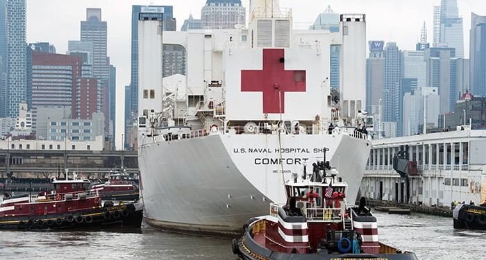 VIDEO CLIP: McAllister Towing anchors the USNS Comfort in New York City image description