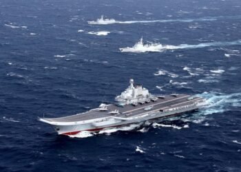 FILE PHOTO: China's Liaoning aircraft carrier with accompanying fleet conducts a drill in an area of South China Sea
