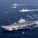 UNITED STATE Shift in South China Sea Raises Risk of Clash on the Water FILE PHOTO: China's Liaoning aircraft carrier with accompanying fleet conducts a drill in an area of South China Sea