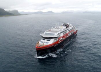 Hurtigruten's cruise ship MS Roald Amundsen is seen in the sea near Ulsteinvik