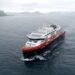 Hurtigruten's cruise ship MS Roald Amundsen is seen in the sea near Ulsteinvik
