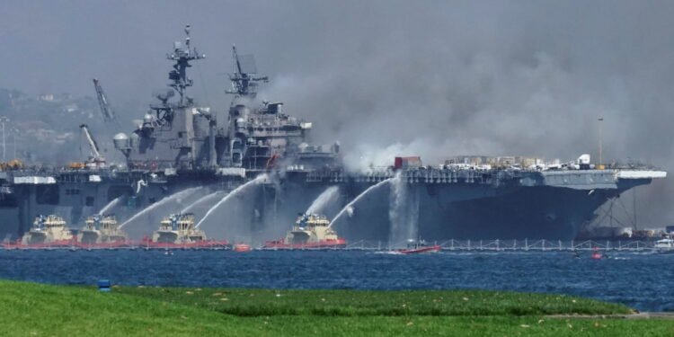 Fire Fighters Battle Stubborn Fire Aboard USS Bonhomme Richard in San Diego Fire Fighters Battle Stubborn Fire Aboard USS Bonhomme Richard in San Diego