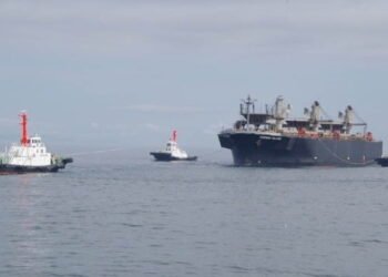 bow section of wrecked bulker docked to offload