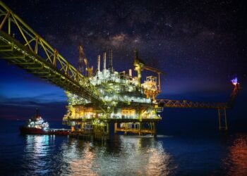 Offshore Oil Rig At Night