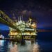 Offshore Oil Rig At Night