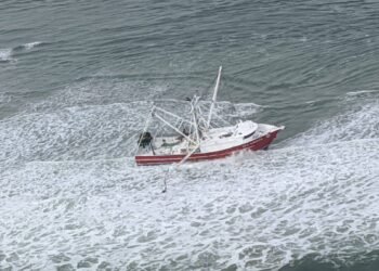 The Coast Guard hoisted four fishermen from an 88-foot fishing vessel in Browns Inlet, North Carolina.