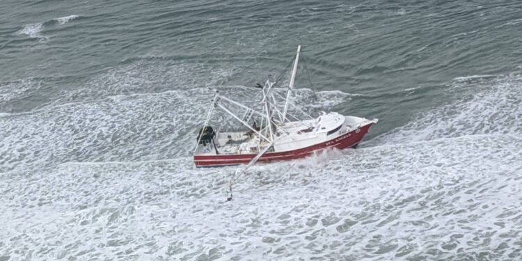 The Coast Guard hoisted four fishermen from an 88-foot fishing vessel in Browns Inlet, North Carolina.