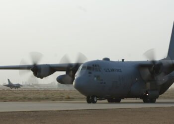 A C-130 Hercules from Pope Air Force Base, N.C., taxies down a runway at Joint Base Balad, Iraq