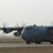 A C-130 Hercules from Pope Air Force Base, N.C., taxies down a runway at Joint Base Balad, Iraq