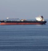 FILE PHOTO: Oil tankers pass through the Strait of Hormuz