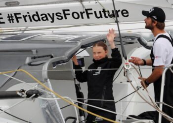 Swedish 16-year-old activist Greta Thunberg sails underneath the Verrazano-Narrows Bridge on the Malizia II racing yacht in New York Harbor