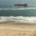 Watch: Ship's Wake Sends Beachgoers Scrambling Watch: Ship’s Wake Sends Beachgoers Scrambling
