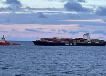 disabled containership under tow off Canada MSC Kim
