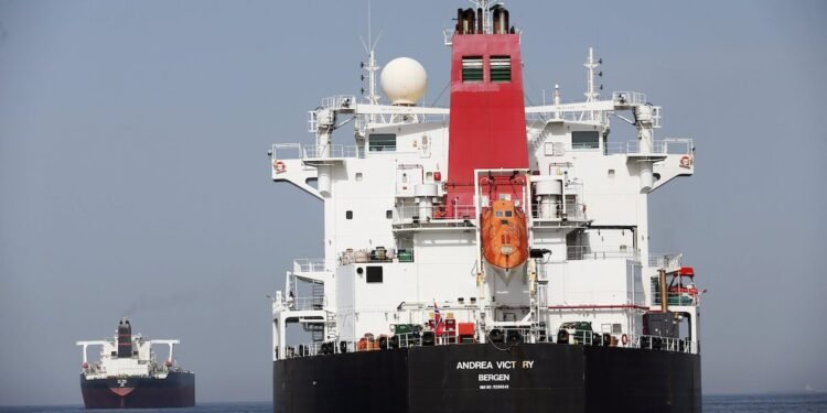 A damaged Andrea Victory ship is seen off the Port of Fujairah