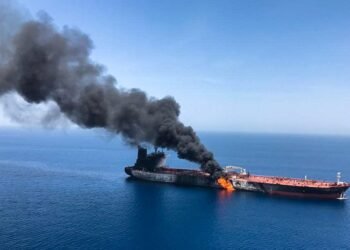 An oil tanker is seen after it was attacked at the Gulf of Oman