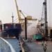 A crane collapses after the Soul of Luck ship slams into a pier in Tanjung Emas, Semarang