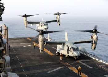 An MV-22 Osprey aircraft lands on the deck of the USS Boxer (LHD-4) in the Arabian Sea off Oman