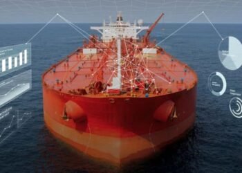 Aerial photo of a large loaded container ship.