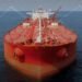 Aerial photo of a large loaded container ship.