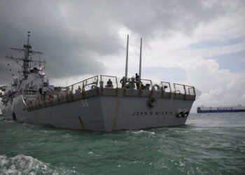 The U.S. Navy guided-missile destroyer USS John S. McCain is seen after a collision, in Singapore waters