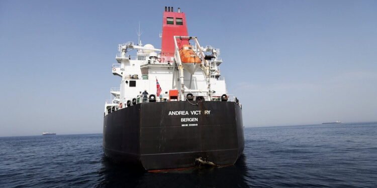 A damaged Andrea Victory ship is seen off the Port of Fujairah