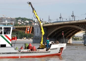 A search operation continues near the Margaret bridge on the Danube river after a boat carrying South Korean tourists capsized in Budapest
