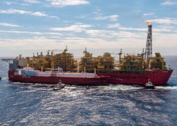 Handout photo of Prelude FLNG Facility with the Valencia Knutsen berthed side-by-side
