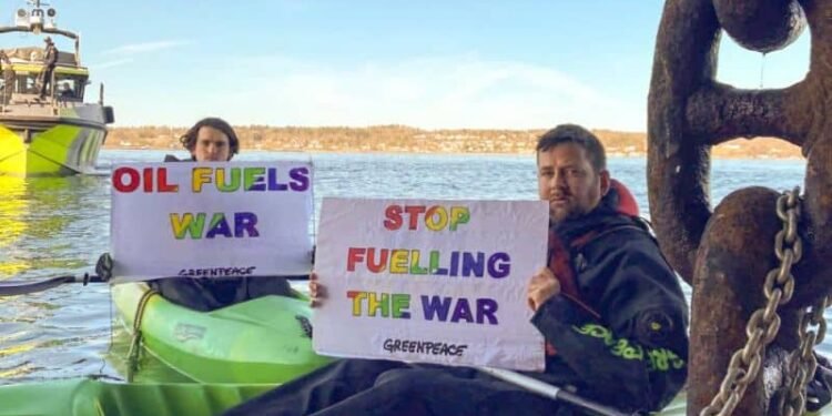 Greenpeace activists Andreas Randoy and Halvard Raavand free use