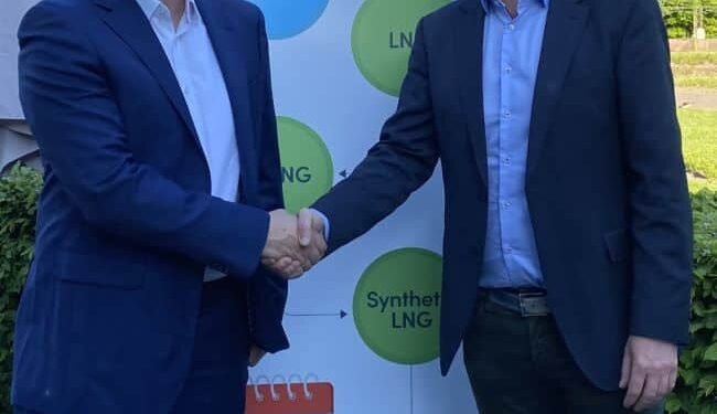 Titan Joins SEA-LNG To Broaden Infrastructure Skill Base Of Coalition Titan & SEA-LNG Execs shake hands