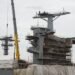 VIDEO CLIP: Newport News sets up top pole of CVN 73 image description