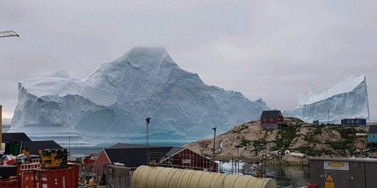 Massive Iceberg Threatens Greenland Village Massive Iceberg Threatens Greenland Village