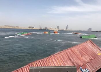 Crews Cleaning Up Containers at Port of Karachi After Ship Scrapes Another