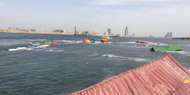 Crews Cleaning Up Containers at Port of Karachi After Ship Scrapes Another