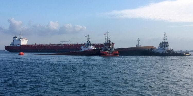 singapore tanker collides with dredger