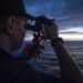 UNITED STATE Merchant Marine Academy Reinstates Sea Year ... Sort Of USMMA Cadet using a sextant for celestial navigation