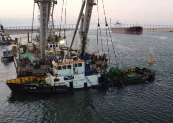 Photos: Suez Canal Recovers Tug After Collision