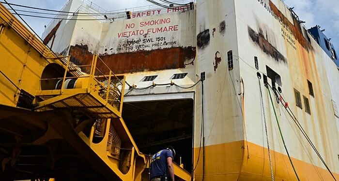 With the ship fire extinguished, the response moves into the salvage and investigation phase.