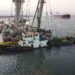 Suez Canal Authority elevates sunken tugboat Sunken tugboat after being raised